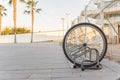 Stolen bicycle, Chained bicycle wheel, front wheel locked Royalty Free Stock Photo