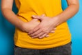 Stomach ache, belly pain. Flatulence discomfort Royalty Free Stock Photo