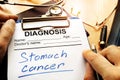 Stomach cancer diagnosis on a diagnostic form.