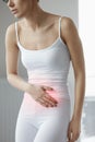 Stomach Health. Closeup Of Beautiful Female Body Feeling Pain Royalty Free Stock Photo