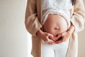 The stomach of a pregnant woman moms hands love Royalty Free Stock Photo