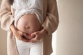 The stomach of a pregnant woman moms hands love Royalty Free Stock Photo