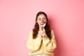 Stomagology and healthcare concept. Young beautiful girl with perfect smile, showing her white teeth with magnifying Royalty Free Stock Photo