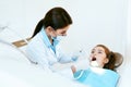 Stomatology. Dentist Working With Girl Teeth In Dental Clinic. Royalty Free Stock Photo