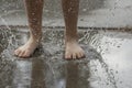 Stomping in the puddle.