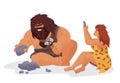 Stone age couple with rocks Royalty Free Stock Photo