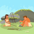 Stone age couple making spears vector illustration Royalty Free Stock Photo