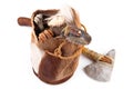 Stone Age Handbag with Cavemen Axe and Tools isolated on white Background Royalty Free Stock Photo