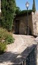 Stone alley going up in the city of Gordes, France Royalty Free Stock Photo