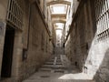 Stone alley in the old city of Jerusalem Israel with bars on windows Royalty Free Stock Photo