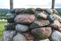 Stone altar in nature on bright sunny day, near water Royalty Free Stock Photo