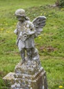 Stone angel statue in church graveyard
