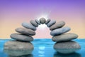 Stone arc with sun at the ocean Royalty Free Stock Photo