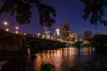 Stone Arch bridge and the downtown Minneapolis Skyline city at night. Long exposure Royalty Free Stock Photo