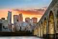 Stone Arch Bridge lights in Minneapolis at sunset Royalty Free Stock Photo