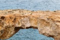 Stone arch close-up, a popular tourist destination in Cyprus. Kamara Tou Koraka, Arch of the Crow