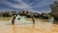 Stone arch made of pebbles on the beach Royalty Free Stock Photo