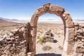 Stone arch ruins tomb mountain Salar De Uyuni Bolivia.