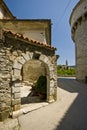 Stone arch and the tower of Pazin castle