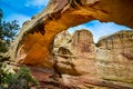 Stone arch under a trail walk in the Capitol reef National Park, Utah USA Royalty Free Stock Photo