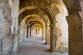 Stone arched gallery of Roman theatre in ancient city of Aspendos, Turkey