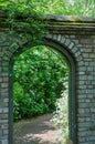Stone arched gate to garden