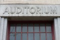 Stone Auditorium Sign over an Outdoor Entrance
