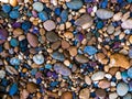 Stone background with round colorful pebbles Royalty Free Stock Photo