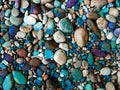 Stone background with round colorful pebbles Royalty Free Stock Photo