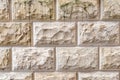 Stone background, sand wall pattern texture. Yellow natural stone facade, wall tiles.