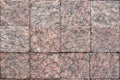 Stone background square bricks granite brown Royalty Free Stock Photo