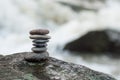 Stone balance on rock in border river Royalty Free Stock Photo