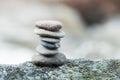 Stone balance on rock in border river Royalty Free Stock Photo