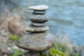 stone balance on rock in border river Royalty Free Stock Photo
