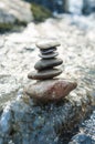 stone balance on rock in the river Royalty Free Stock Photo