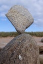Stone balancing on stone