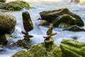 Stone balancing by the river Royalty Free Stock Photo