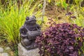 Stone balinese mossy statue Bali island Indonesia