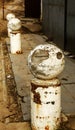 Stone balls on a city street. Urban design fencing road. Large outdoor decorative large cracks from natural granite spheres.