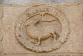 A stone bas-relief, Christ the Lamb of God, Italy