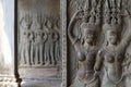Stone bas-relief with human figure in Angkor Wat, Siem Reap, Cambodia. Devata bas-relief closeup in ancient temple.