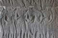 Stone bas-relief with human figures in Angkor Wat temple, Siem Reap, Cambodia. Male figure stone carving on ancient wall