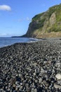 Stone beach in Flores, Azores archipelago (Portugal) Royalty Free Stock Photo