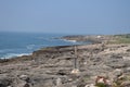 Stone Beach Near Fort Of Saint George Of Octaves In Cascais. Photograph of Street, Nature, architecture, history, Geology. April Royalty Free Stock Photo