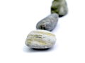 stone from the beach pictured in studio on white background