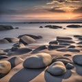 Stone beach by the sea at sunset. Stones in the foreground. Long exposure Royalty Free Stock Photo