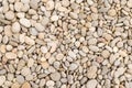 Stone beige smooth river pebble shore