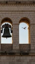 Stone bell tower featuring two visible arched openings. Each arch is supported by Royalty Free Stock Photo