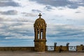 Stone bell tower in neo Gothic style of Sagrat Cor church on top of Mount Tibidabo