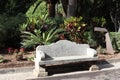 Stone bench along the alley in Garcia Sanabira public park, Santa Cruz de Tenerife